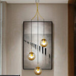Three light amber glass globe cluster pendant light by glitteron lights