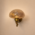 Dazzling gold finish wall light with amber glass by glitteron lights